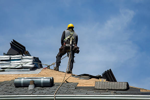 Professional Gutter Installation technician working in Ashland, OR